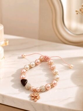 Delicate Pink Pearl Charm Bracelet with Rose Gold Flower